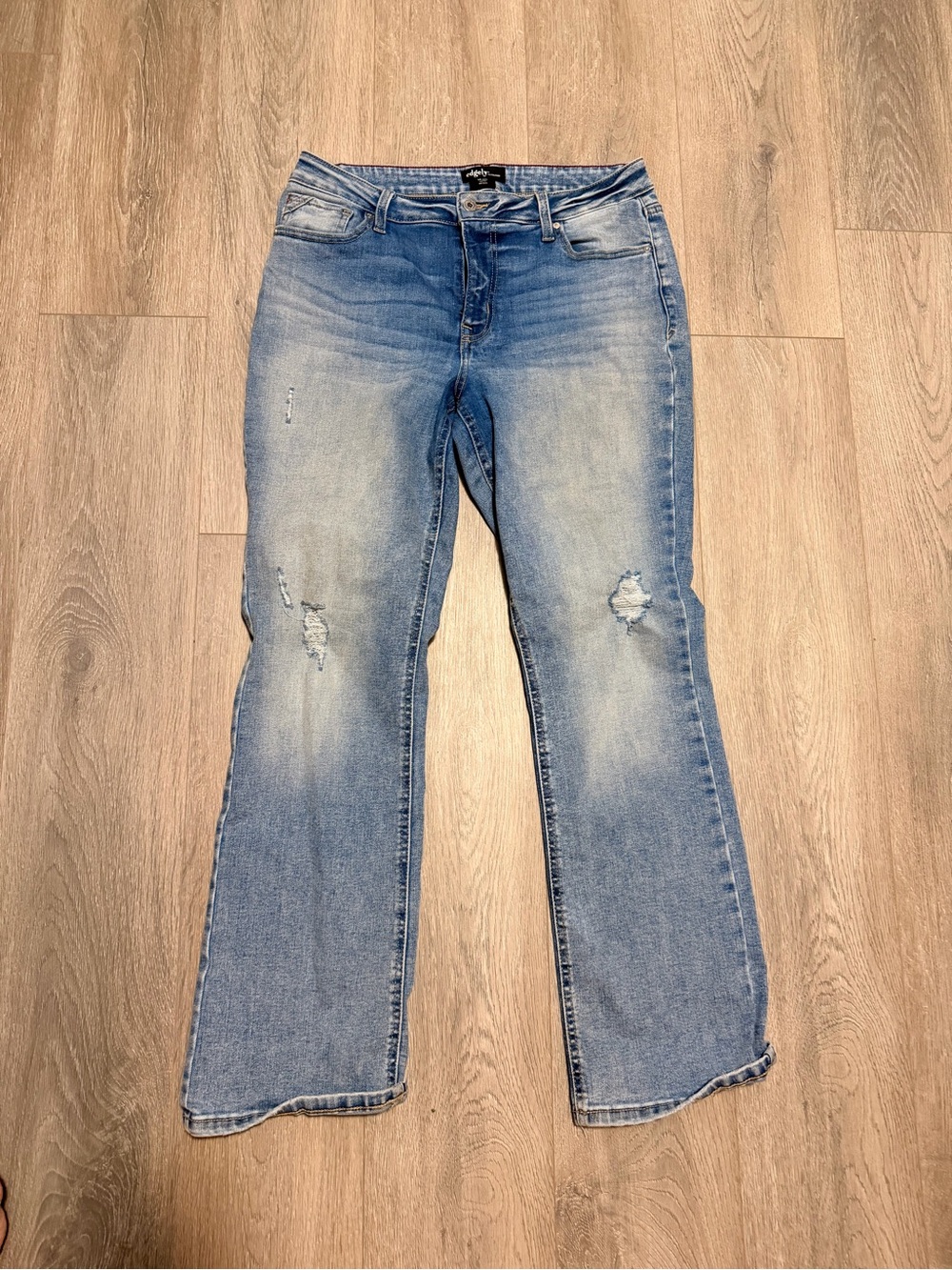 Light Blue Women's Flare Jeans with Distressed Detail